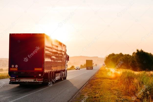 arriving-truck-on-the-road-in-a-rural-landscape-at-sunset_93200-4184.jpg.081dd0791431822864ea5309bf7589fa.jpg